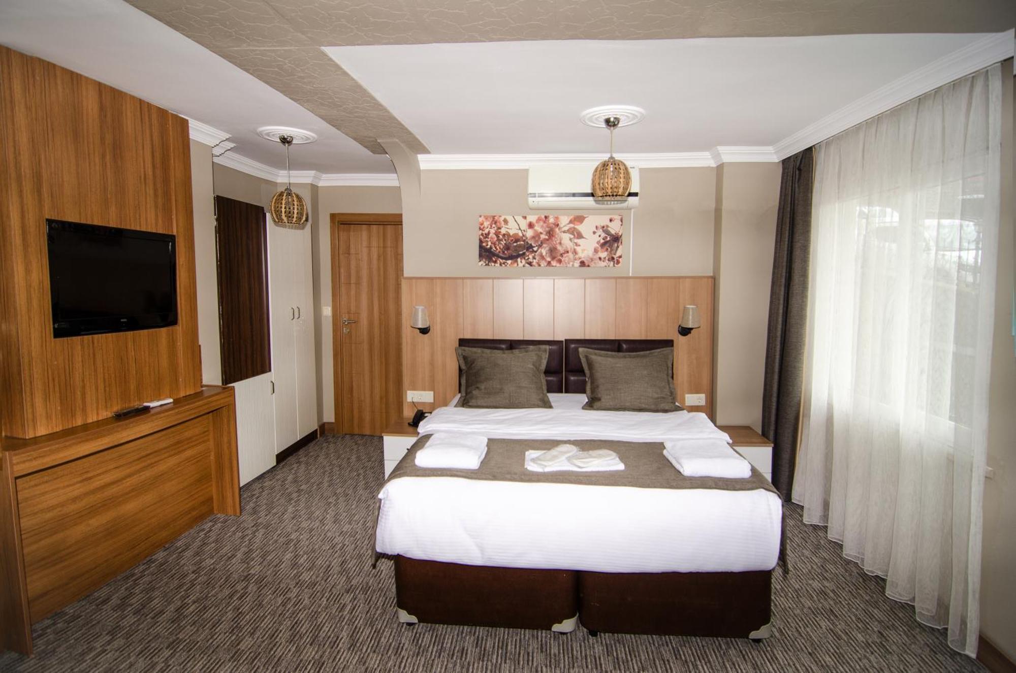 ترابزون Nova Suite Residence الغرفة الصورة